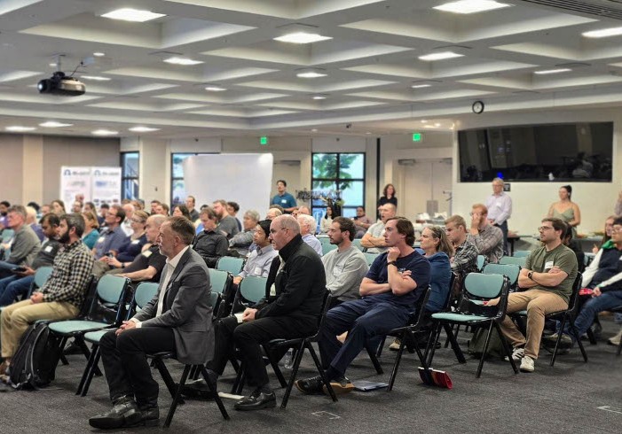 crowd listening to talk